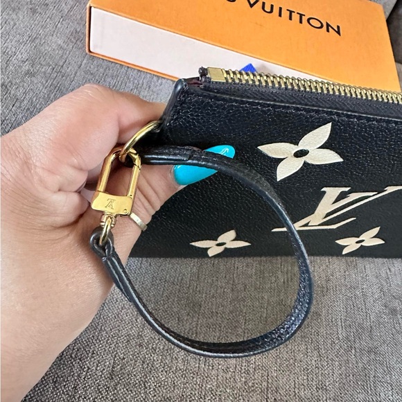 Louis Vuitton Black Clutch with Iconic LV Logo and Decorative Floral Elements - Picture 5 of 6
